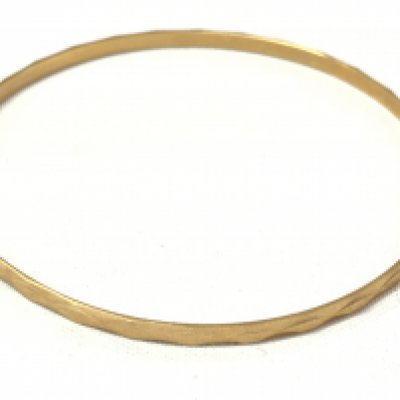 An 18ct gold bracelet , postage category A