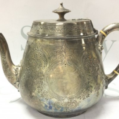 An Ornate Late 19th century teapot , marked London 1880. Postage category B