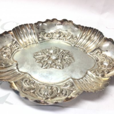 A hallmarked silver embossed fruit bowl . Marked Sheffield 1909. 23cm wide. Postage category B