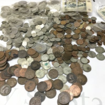 A collection of British coins including pennies, half crowns, shillings, six pence Etc . Postage category B