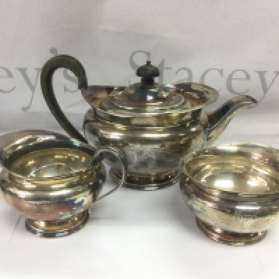 A three piece silver tea set, Sheffield hallmarks, approx 1kg. Shipping category B.