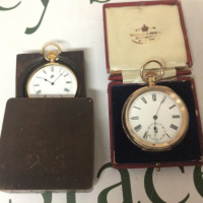 A Gold plated pocket watch with an enamel dial working and one other gold plated pocket watch in a continental carved wood case not seen working (2)