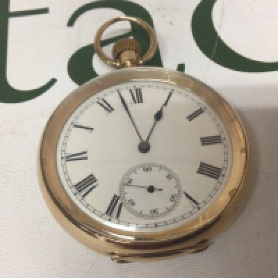 An Elgin gold plated button wind pocket watch with a white enamel dial the inner back plate with personal inscription dated 1913.