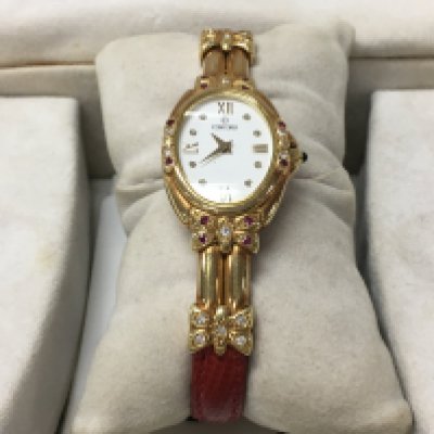 An 18ct gold Concord ladies watch, with certificate.Postage category A