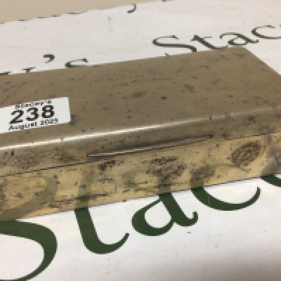 A Silver cigarette box of rectangular shape the top with an inscription and dated 1930 London hallmarks 18x9cm