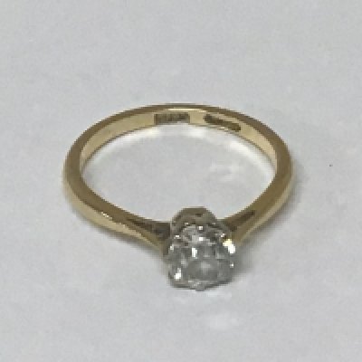 An 18carat gold ring set with an old cut diamond approximately 0.25 of a carat. Total weight 2.2g