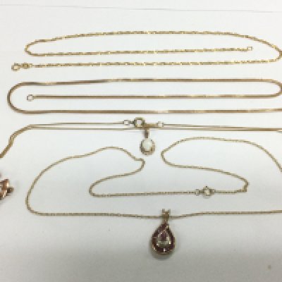 A collection of gold necklaces and pendants, approx 12.5g. Shipping category A.