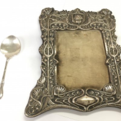 A vintage silver picture frame and a silver hallmarked spoon. Postage B