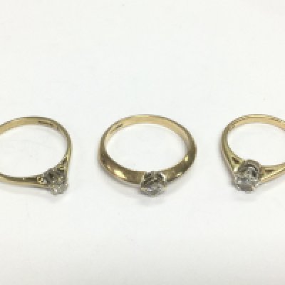 Three 9ct gold diamond solitaire rings, approx sizes J, O and Q. Total approx 5.9g. Shipping category A.