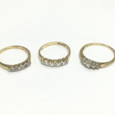 Three 9ct gold five stone diamond rings, approx sizes N, L and P. Total approx 5.6g. Shipping category A.
