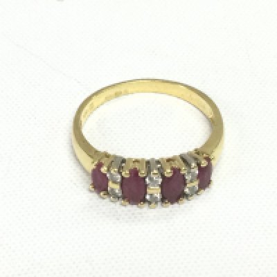 An 18ct gold, ruby and marquise cut diamond ring, approx 3.4g and approx size N-O. Shipping category A.
