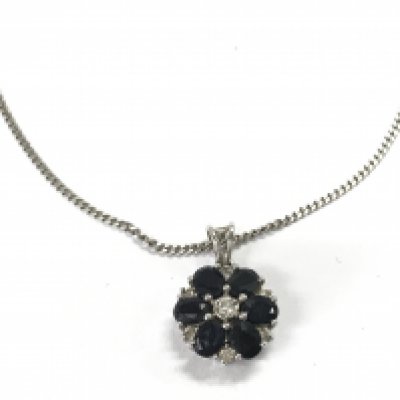 A 9ct white gold necklace with a sapphire set pendant. 3.36g Postage A