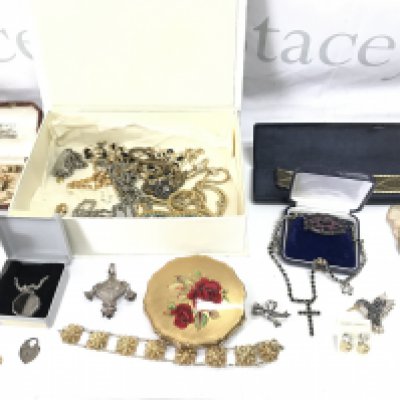 A collection of assorted costume jewellery including various silver and gold items.