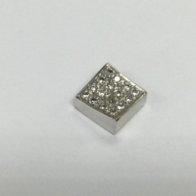 An unmarked (tested high carat) white gold pendant set with small diamonds, approx length 2cm. Shipping category A.