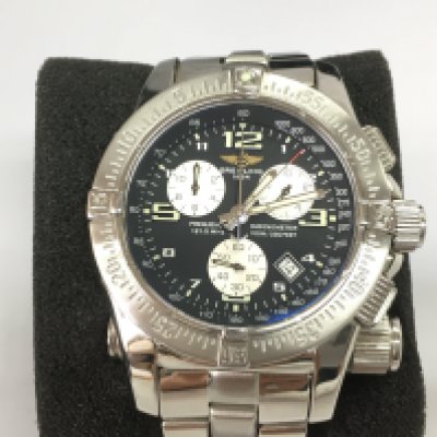 A gents Breitling emergency mission watch with box (missing original inner box) and paperwork. Has service paperwork. 45mm case. Seen running. Postage B