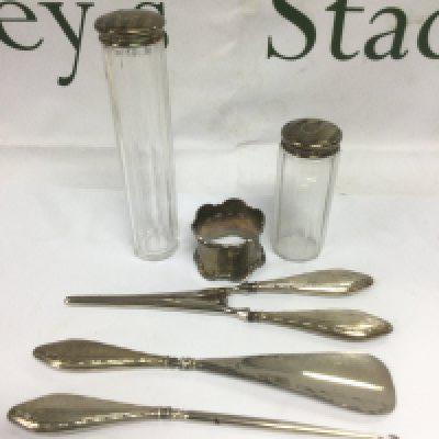 Two silver topped scent bottles, silver napkin ring, silver handled button hook etc. Shipping category D.- NO RESERVE