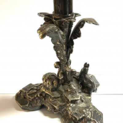 A good quality silver plated candlestick with ferns and rabbits. 17cm.- NO RESERVE