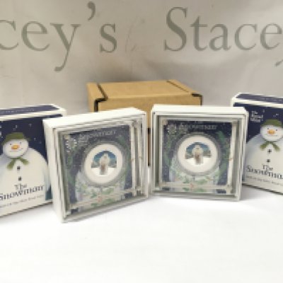 Two boxed Royal Mint snowman 2019 UK 50p silver proof coins . Postage category B