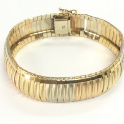 An 18ct gold tri coloured bracelet. 42g and 19cm long.