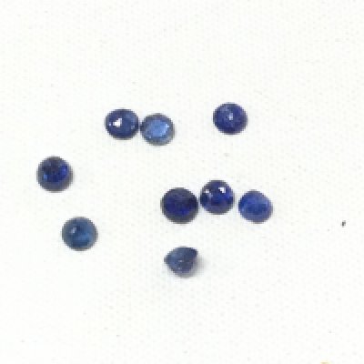 Parcel of 9 loose, unmounted round-cut blue and blue-green sapphires totalling 2.26ct