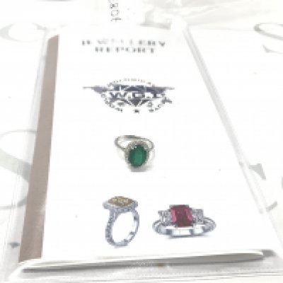 Certificated 18ct white gold oval emerald and RBC diamond cluster ring. Emerald 3.33ct. Diamonds 0.40ct. Cert no. WGI9634154122