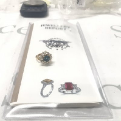 Exciting, certified 18ct yellow gold blue topaz ring with surrounding marquise, baguette and RBC diamonds. Square emerald-cut topaz 3.20ct. Diamonds 1.75ct Cert no. WGI9634154122