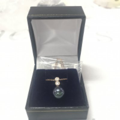 9ct rose gold iridescent dark pearl and double drop diamond necklace, boxed. Diamonds 0.20ct.