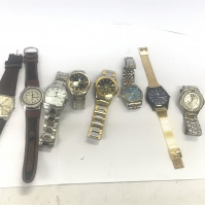 A collection of 8 Gents watches - all seen working
