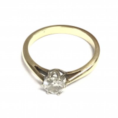 An unmarked 18ct gold ring set with solitaire diamond which is approximately 0.85ct. Size O 1/2. Postage B