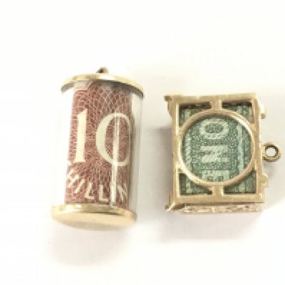 Two vintage 9ct gold charms both containing old English bank notes.