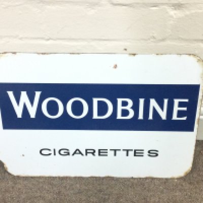 A double sided cigarettes sign advertising woodbine and golden Virginia 18 x 12 inches approximately