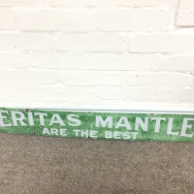 ENAMEL SIGN 'VERITAS MANTELS' 39 x 5.5 inches approximately