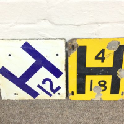 TWO VINTAGE ENAMEL FIRE HYDRANT SIGN