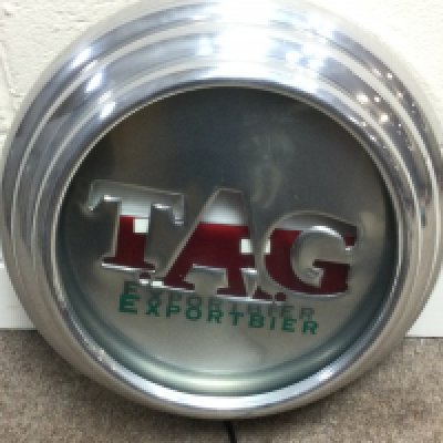 Vintage metal beer sign. Not seen working Approximately 16.5 inches diameter