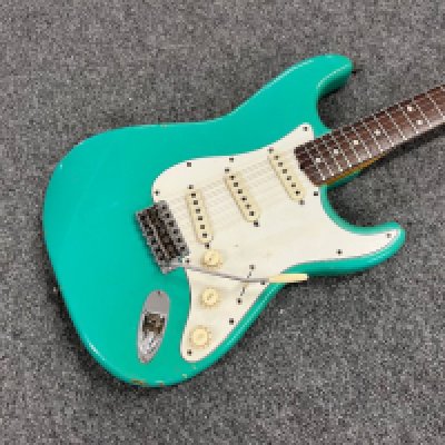 A 1966 Fender Stratocaster electric guitar in foam green. Body only refinish by Clive Brown. Original parts/ pickups/pots. Overall good/very good condition. Missing rear trem. cavity cover. Comes with period correct orange lined Fender case.