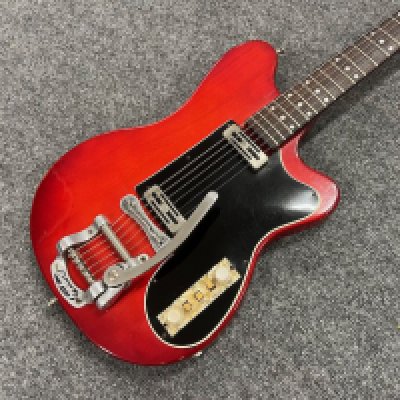 A 1961 Hofner V4 Solid Electric Guitar. One of the rarer Hofner V series solid guitars from the early 1960's with Bigsby and "doggone" bridge. This one is in very good all original condition with very light fretwear and playwear.