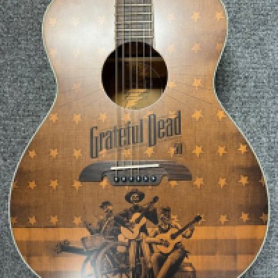 An Alvarez GDF 1965 1122 Grateful Dead Themed Limited Edition Acoustic Guitar - OM Size body with Grateful Dead Themed Graphics - in mint as new condition. Still in original packaging with no evidence of any real playwear.