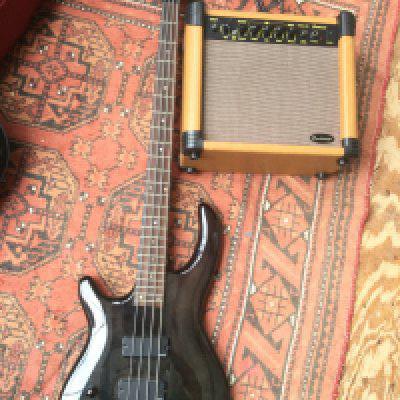 A Dean left handed bass guitar with soft carry case and an Eastcoast practice amp (2).