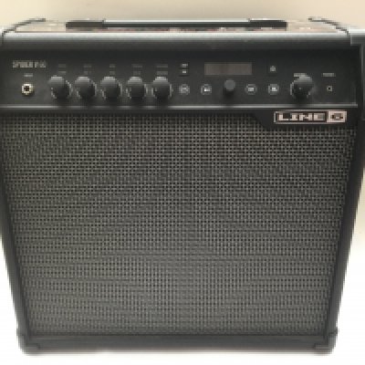A boxed Line 6 Spider V60 guitar amplifier.