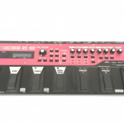 A Boss RC50 loop station guitar pedal board.