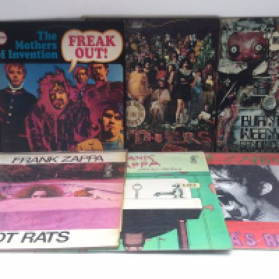 Two bags containing eleven Frank Zappa and related LPs and 12" singles comprising various early UK pressings, a white label 12", picture disc etc.