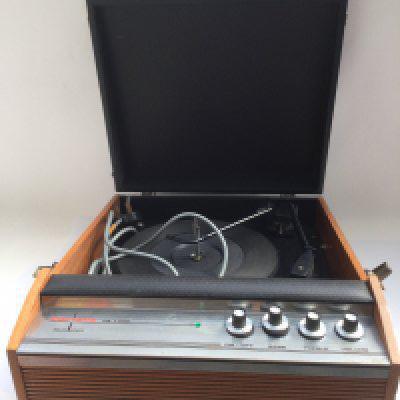 A Corvette De Luxe portable record player.