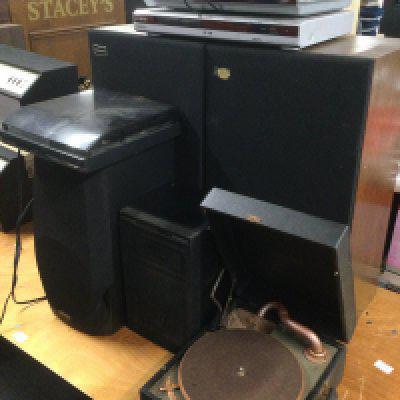 A collection of audio visual equipment comprising a pair of floorstanding Sanyo speakers, a Kenwood record player, a Brunswick gramophone, two DVD players etc (8).