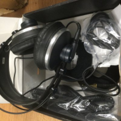 A boxed pair of AKG K 271 headphones.