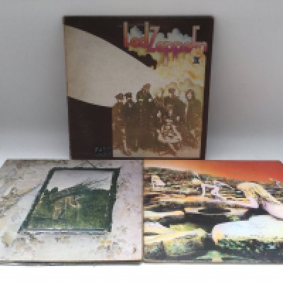 Three Led Zeppelin LPs comprising early UK pressings of Led Zep II, IV and Houses Of The Holy. Some scratches to Led Zep II.