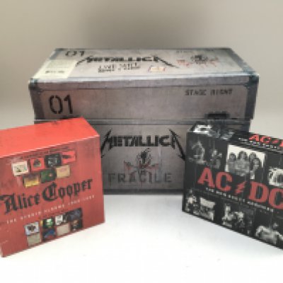 An Alice Cooper 'The Studio Albums1969-1983' multi CD box set, a Metallica 'Live S*it' video box set and an AC/DC 3CD box set (3).