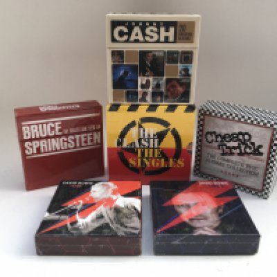 Six CD box sets by various artists including David Bowie, The Clash and others.