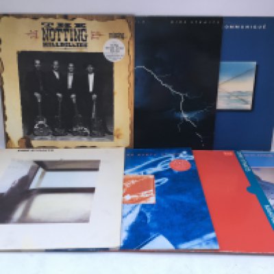Seven Dire Straits and related LPs.