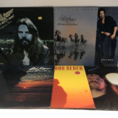 Six Bob Seger & The Silver Bullet Band LPs including 'The Distance', 'Against The Wind' and others.