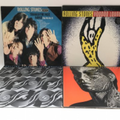 Four Rolling Stones LPs comprising 'Voodoo Lounge', 'Steel Wheels', 'Tattoo You' and 'Through The Past, Darkly'.